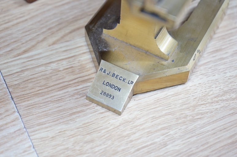 An R&J Beck London cased brass microscope, 31cm high. Condition - good
